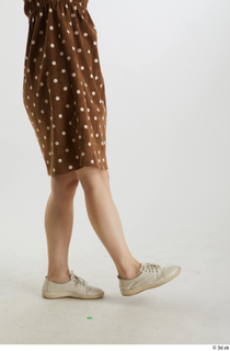 Aera  1 brown dots dress casual dressed flexing leg…